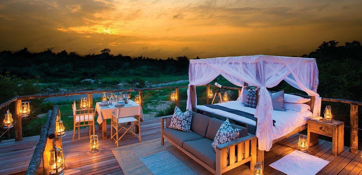 Tented safari camp at dusk for a tailor-made Wildlife Dreams journey